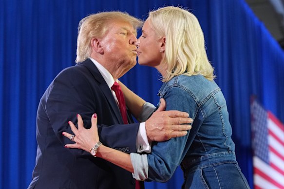 US President Donald Trump greeted Iowa Senate candidate Ashley Hinson at Thursday night’s campaign rally in Sioux City.