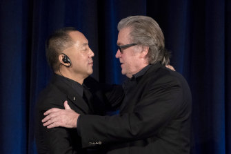 Former White House chief strategist Steve Bannon, right, greets runaway Chinese billionaire Guo Wengui in New York.