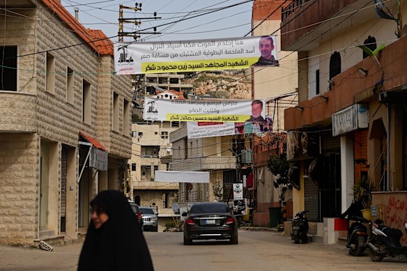 Banners in the streets with photographs of the Hezbollah supporters who died in the firefight.