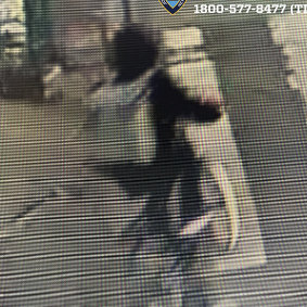 The suspect fleeing on bike after the killing of UnitedHealthcare CEO Brian Thompson.