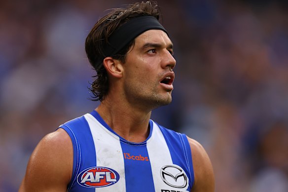 North Melbourne’s Jy Simpkin was given a warning by the AFL after airing his frustration at the suspension of teammate Paul Curtis.