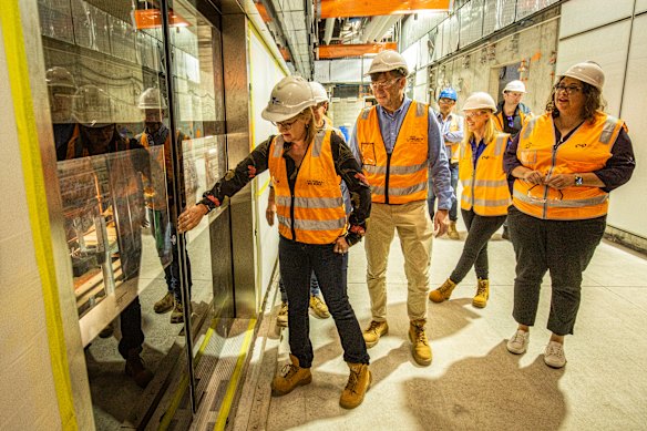 Jacinta Allan, then the acting premier and now the premier, inspects the new platform train doors at Parkville station  in 2023.