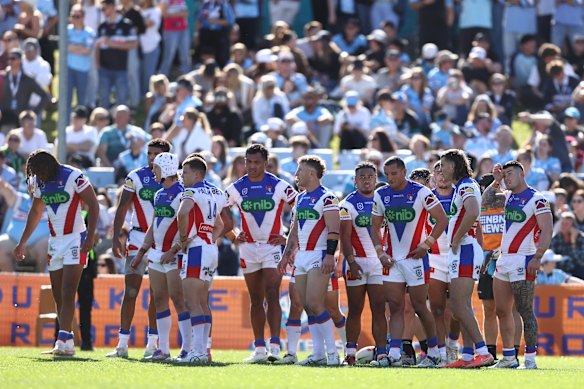Newcastle players after conceding another try.