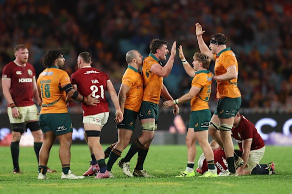 The Wallabies celebrate a key turnover.