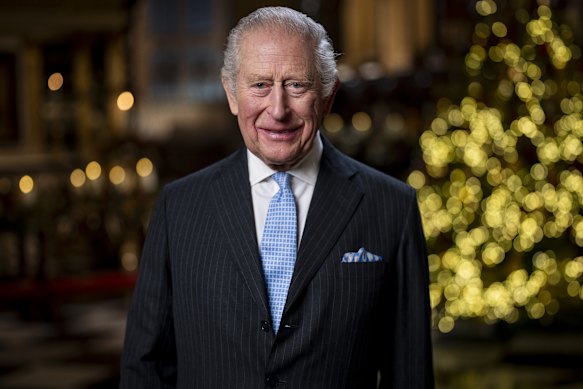 King Charles III poses during the recording of his Christmas message in the Lady Chapel of Westminster Abbey.