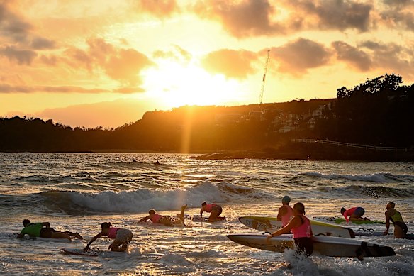 Paddle boarders in small surf at Manly on Wednesday.
