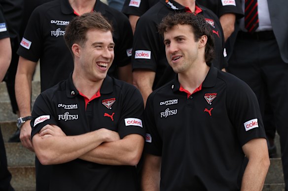 Bombers stars Zach Merrett and Andrew McGrath during happier times earlier this year.