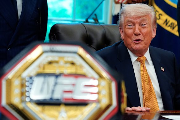Donald Trump meets with UFC fighters in the Oval Office last month.