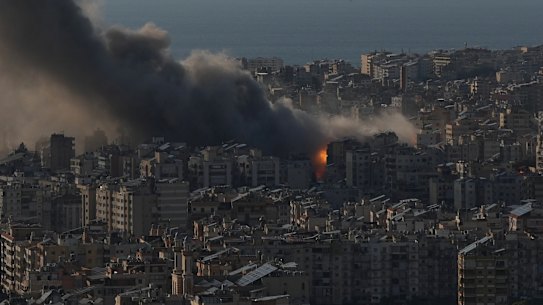 Flames and smoke rise following Israeli airstrikes on Dahiyeh, a southern suburb of Beirut, Lebanon, on Monday.