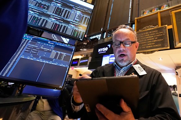 Wall Street retreated after inflation came in higher than expected but Nvidia helped prop up indexes.