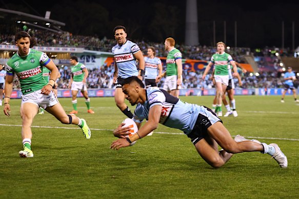 Ronnie Mulitalo scores the Sharks’ first try against the Raiders on Saturday night.
