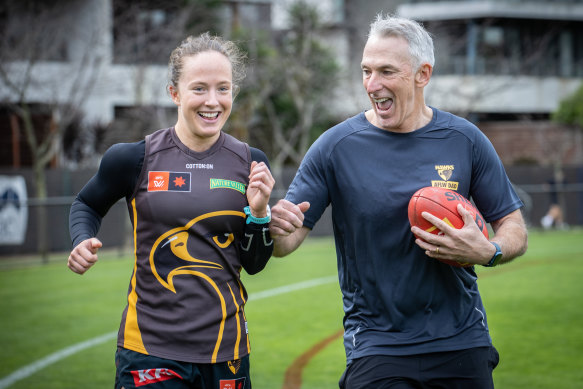 Jasmine and her father Damien Fleming during Hawthorn’s first 2024 training session. 