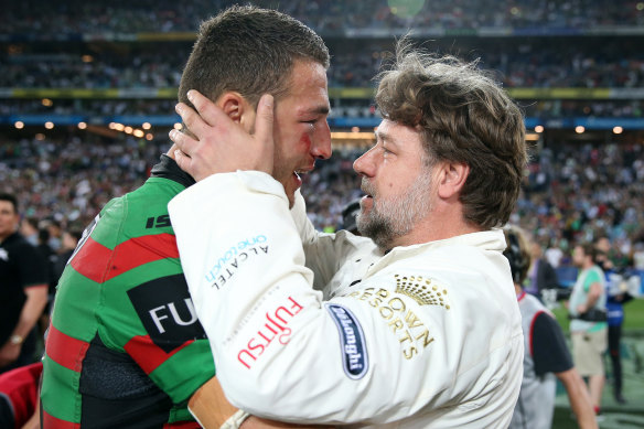 Sam Burgess with Russell Crowe after South Sydney won the 2014 grand final.