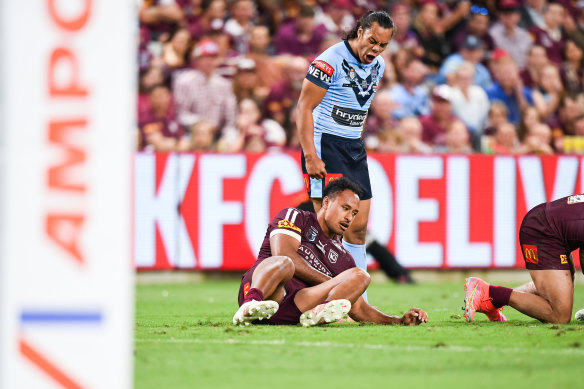 Jarome Luai roars at Felise Kaufusi in Origin I in 2021.