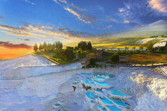 Pamukkale, celebrated  for its cascading achromatic  calcite terraces.