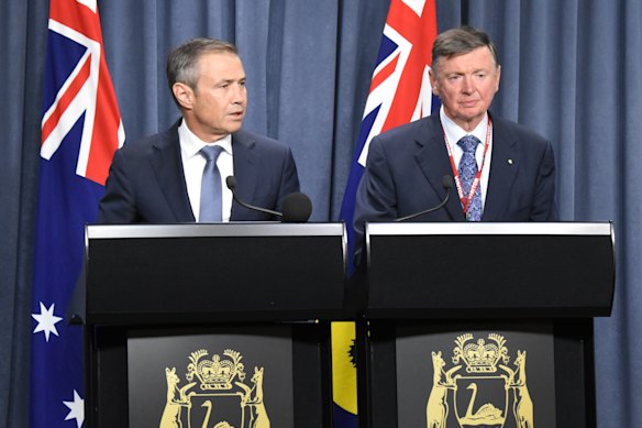Now-Premier Roger Cook and former WA governor Malcolm McCusker during a press conference in 2018.