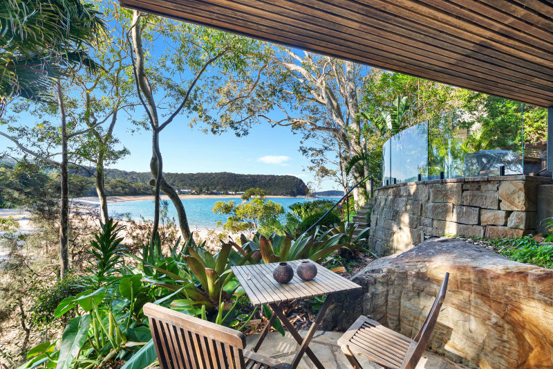 The Pearl Beach weekender bought by Karen Moses is set at the north-facing end of the beach.