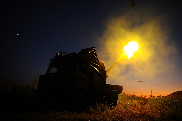 In this photo provided by Ukraine’s Territorial Defence press service, soldiers shoot at Russian targets near Kharkiv on Wednesday. 