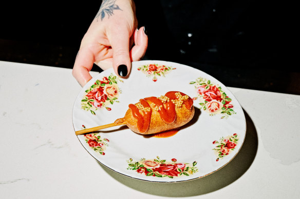 Smith + Daughters Social Club’s plant-based corn dogs come with golden curry ketchup and mustard seeds.