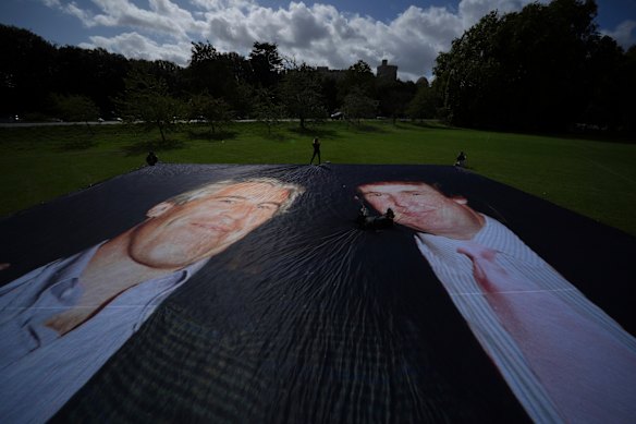 Activist from the protest group Everyone Hates Elon put up a banner of Trump and sex offender Jeffrey Epstein.