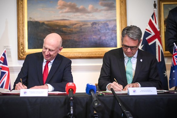 UK Secretary of State for Defence, John Healey and Australia’s Defence Minister Richard Marles signing the Geelong Treaty  on Saturday.