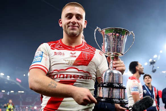 Mikey Lewis with the Super League trophy after his man-of-the-match performance in the grand final.