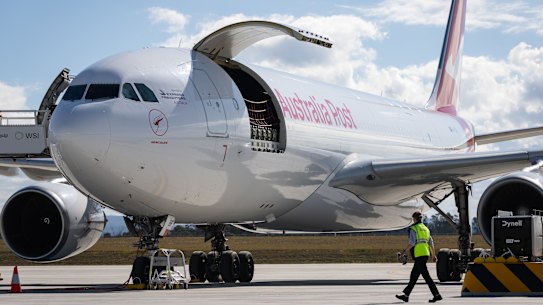 A Qantas A330 freighter is parked in front of the cargo hub on Monday.