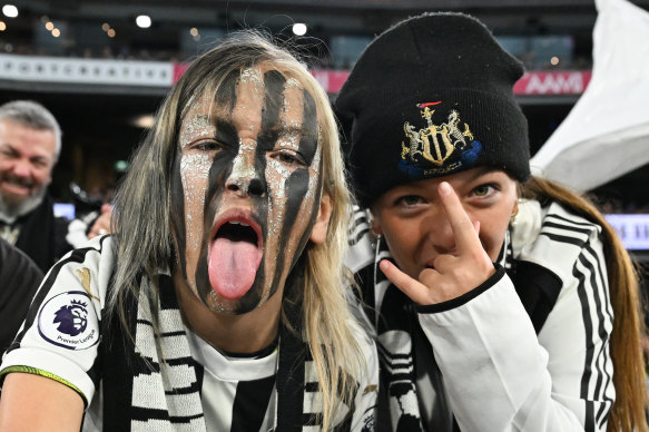 Newcastle United fans show their colours late in the first half.