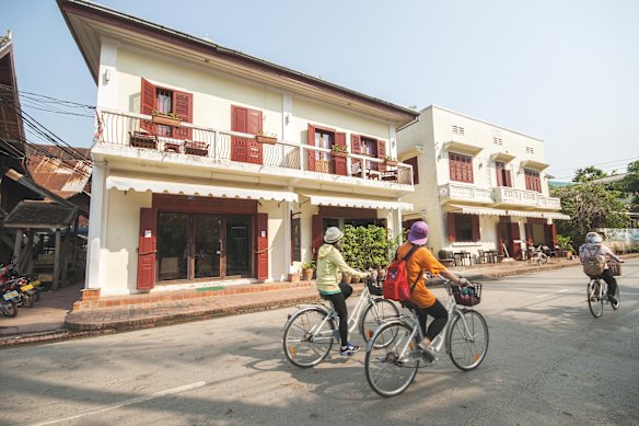 Cycling to visit Luang Prabang, a small cultural city in Laos.