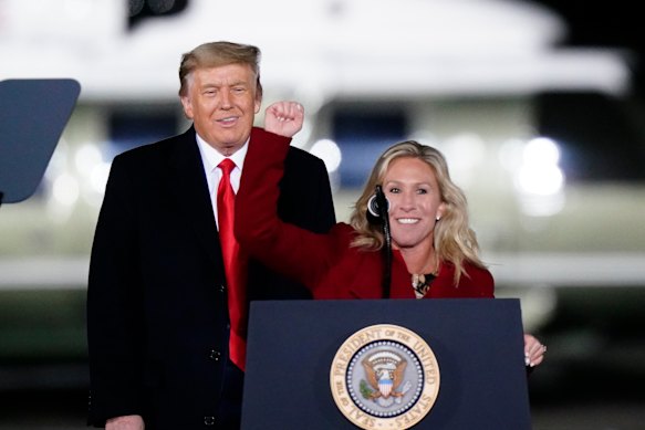 Greene joins Trump at a rally in Dalton, Georgia, in January 2021.