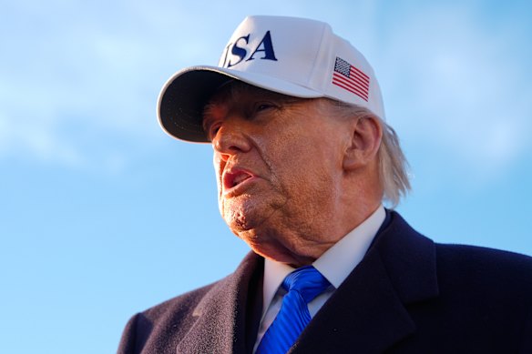 US President Donald Trump speaks to reporters on Friday. 