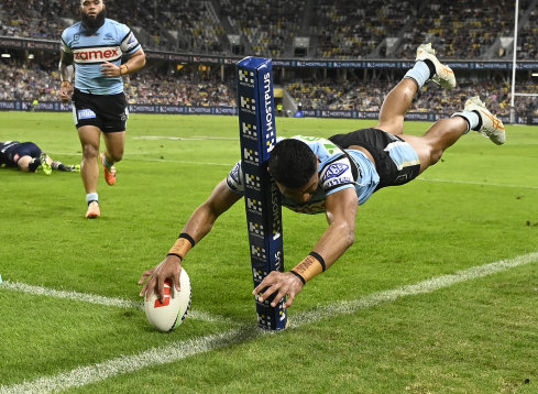 Ronaldo Mulitalo scores a spectacular effort   successful  the country   for the Sharks.
