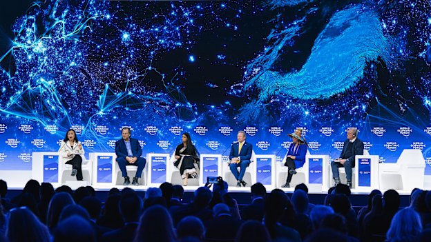Andrew Forrest [centre] at Davos in 2023. 