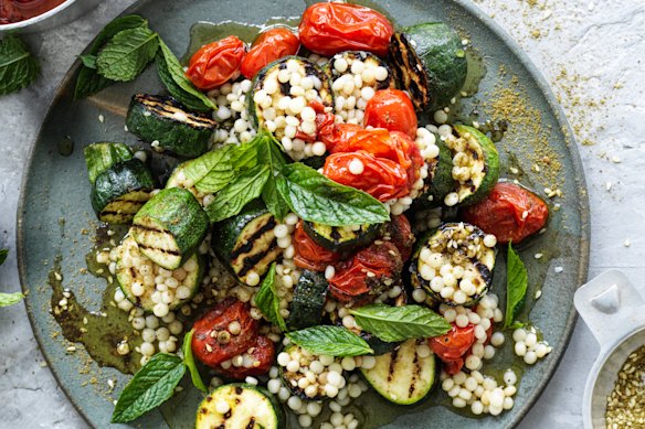 Hetty McKinnon's grilled zucchini, zaatar and pearl cous cous salad with cherry tomato confit.