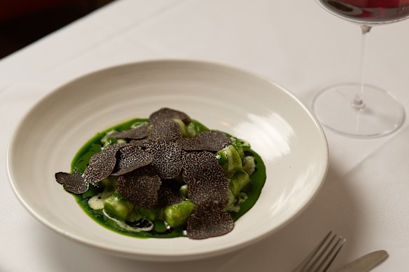 Gnocchi with comte, kale and freshly shaved black truffle.