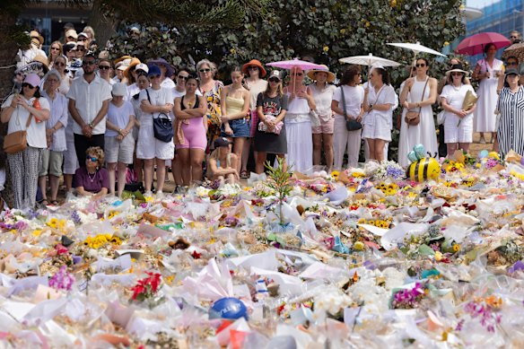 A gathering of women at the vigil for the victims of the Bondi terror attack on Sunday’s official day of remembrance.