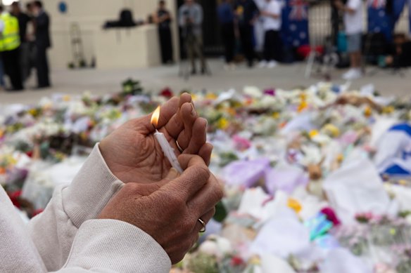 A floral memorial is growing daily near the scene of the shooting at Bondi.