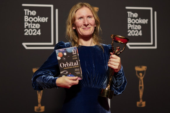 Samantha Harvey poses with the trophy and her book Orbital after winning the Booker Prize last November.