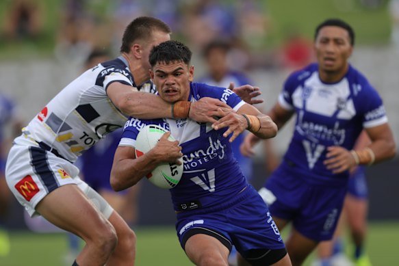  Taye Cochrane takes it up for the Bulldogs against the Cowboys at Kogarah on Saturday.