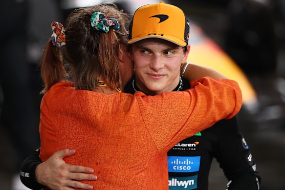 Oscar Piastri embraces Lando Norris’ mum Cisca Wauman.