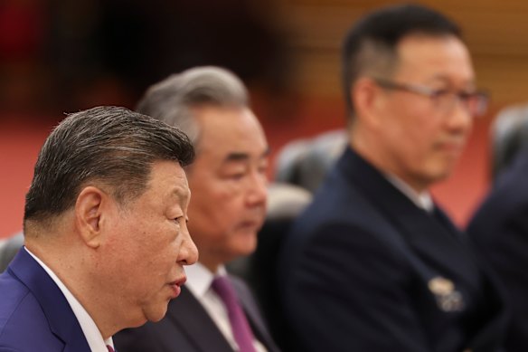 Chinese President Xi Jinping, left, seated next to China’s Foreign Minister Wang Yi at the bilateral meeting with President Trump.