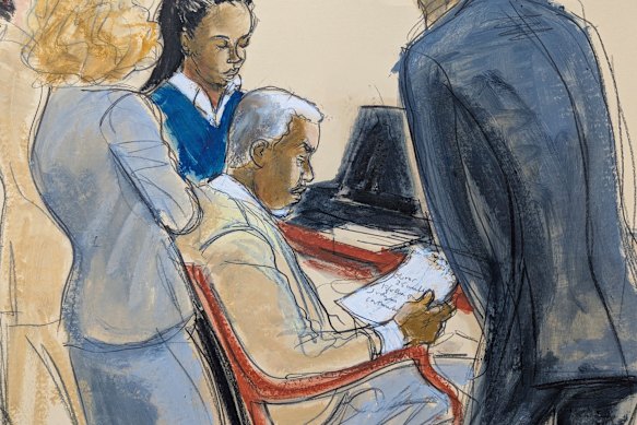 An illustration showing Combs, centre, reading a jury note with his defence lawyers.
