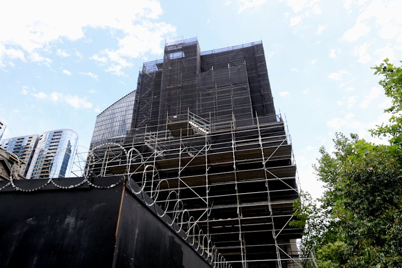 Media House covered in scaffolding while flammable cladding is removed.