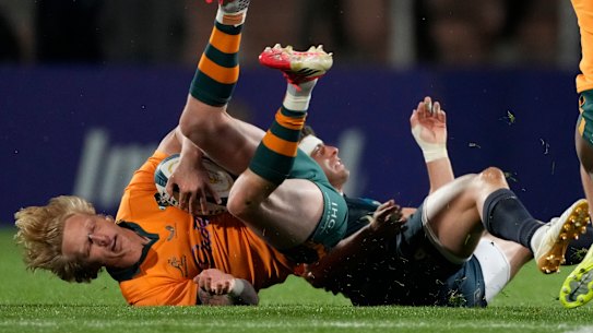 Carter Gordon is tackled in Mendoza.
