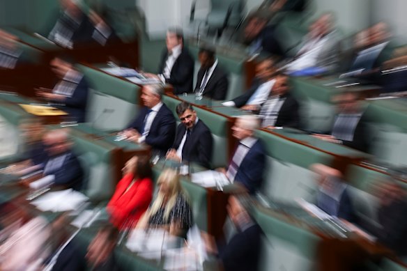 Angus Taylor is seen on the opposition backbench the day before the Liberal party leadership spill.