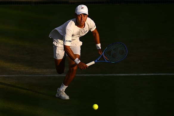 Rinky Hijikata plays a backhand against Ben Shelton.