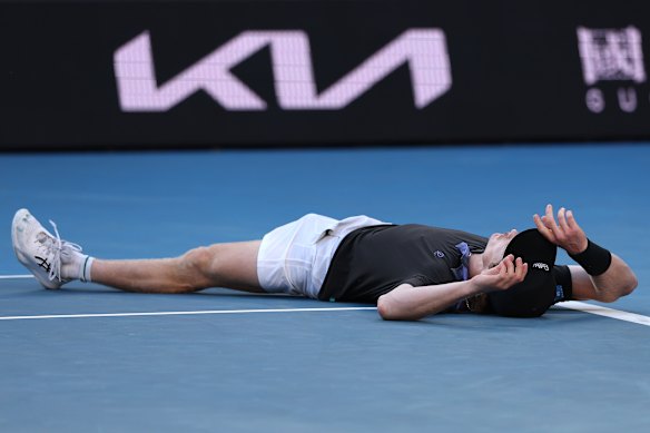 Dane Sweeny collapses after his round one victory.