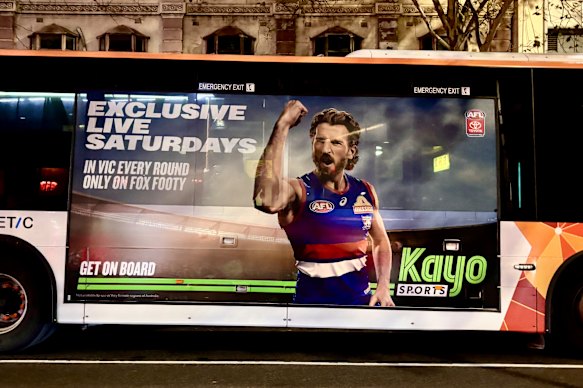 An advertisement for Kayo Sports promoting its exclusive AFL coverage on Fox Footy on Saturdays.