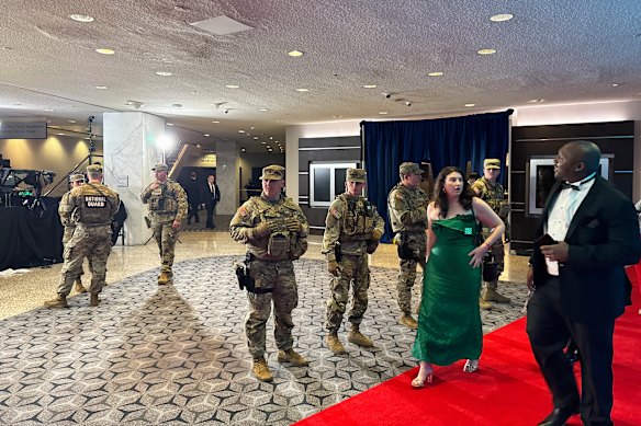 The National Guard escorting guests from the ballroom.