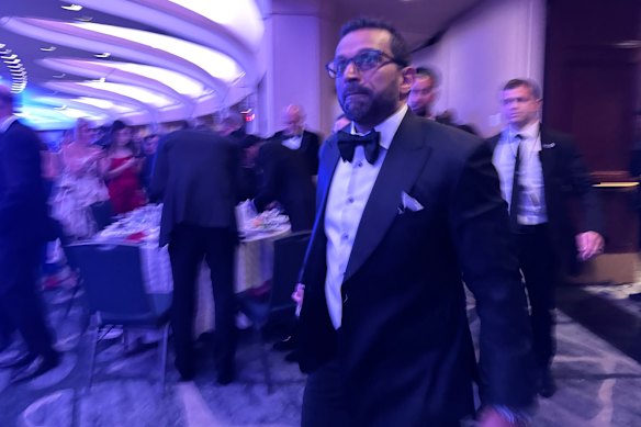 FBI director Kash Patel rushing from the ballroom after gunshots were fired.
